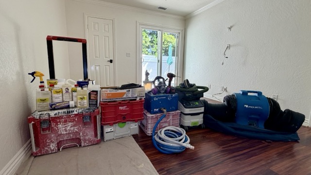 Bathtub reglazing equipment and materials for one Orange County job — HVLP turbine, dust extractor, respirator, air mover, and coating chemistry